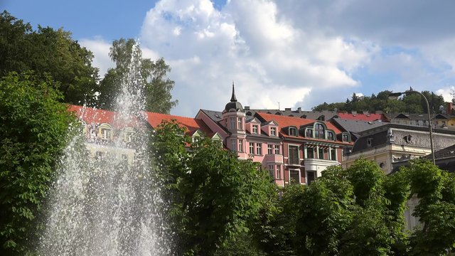 Types of Karlovy Vary. Fountain of Tepla river from Stara Louka street. Bohemia, Czech Republic.