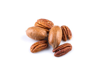 Few pecan nuts isolated on white