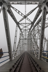 Fototapeta na wymiar Superstructure of railway steel truss bridge in Krakow, Poland, over Vistula river