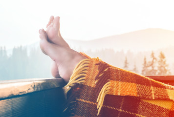 Young woman relaxing in mountains