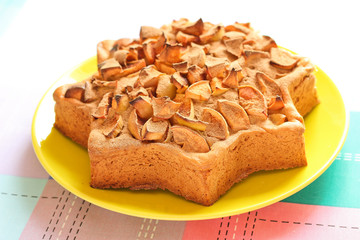 Delicious homemade cake with apples and cinnamon star-shaped