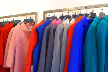 clothes rack with ladies winter coats for sale