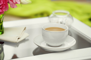 Cup of coffee on table close up