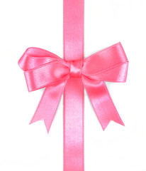 Pink ribbon bow isolated on white
