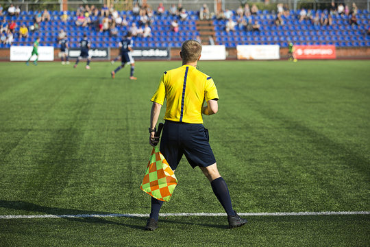 Assistant referee with  flag
