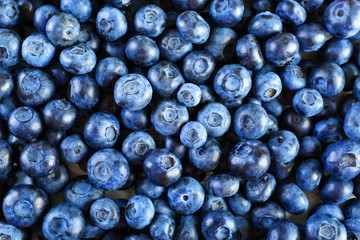 Heap of tasty ripe blueberries close up