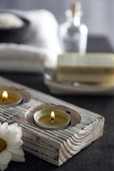 Composition of spa treatment on table colorful background