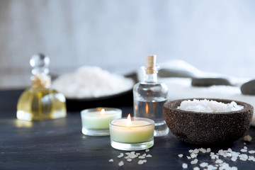 Composition of spa treatment on table colorful background