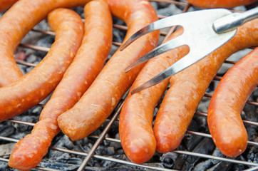 sausages on the grill