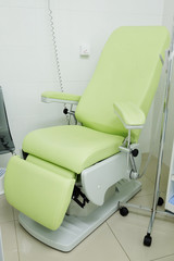 Green chair in a medical office