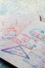 Fototapeta na wymiar Macro of arrival stamps of south east asia in passport