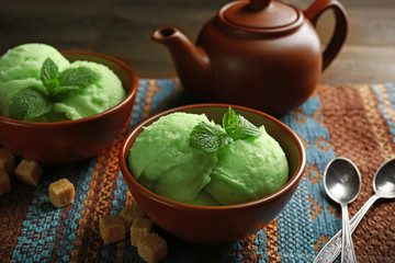 Homemade Green tea ice-cream on dark wooden background