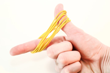 Rubber bands for office isolated on white background and handheld