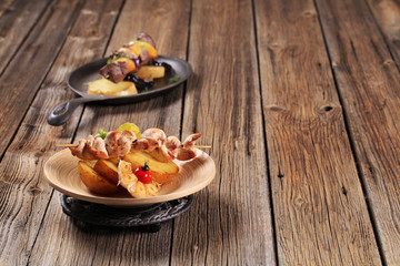 Chicken kebab and roasted potato