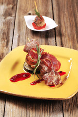 Venison souvlaki and bacon strip