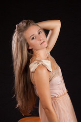 Naklejka premium Pretty woman with long hair looking thoughtful