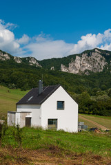 Fototapeta na wymiar House near rocks - Sulov, Slovakia