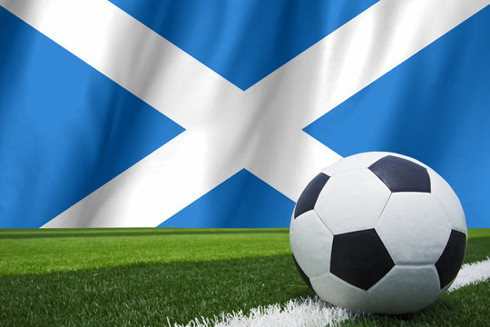 Flag Of Scotland With Football In Front Of It