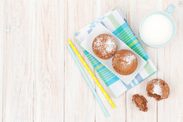 Cup of milk and cakes