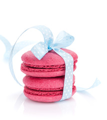 Red macarons with blue ribbon