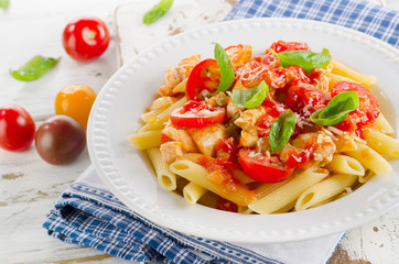 Pasta with Chicken,Bolognese Sauce, Parmesan Cheese and Basil.