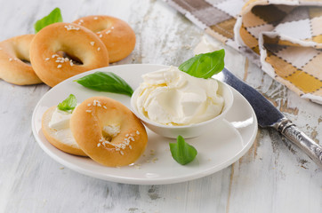 Fresh bagel with cream cheese for a breakfast.