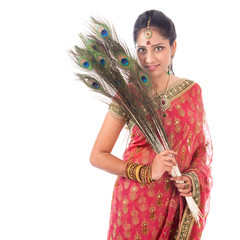 Beautiful Indian woman with peacock feathers