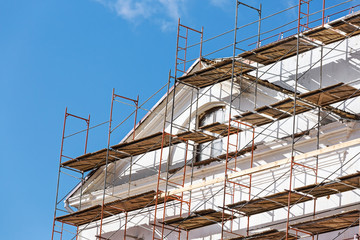 renovating facade of a house