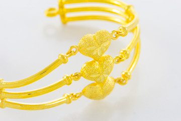 Gold Bracelet Over White Background