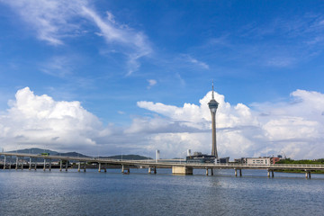 Fototapeta na wymiar View of Macau travel tower, Nam Van Lake, and Macau-Taipa Bridge 