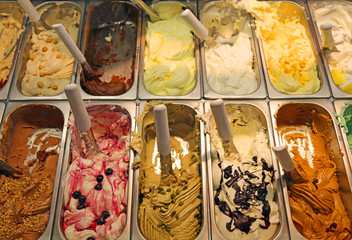 bar with many flavors of delicious ice cream for sale
