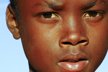 African boy - Confidence that can only grow out of a strong hear