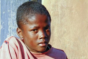 African boy - Confidence that can only grow out of a strong hear