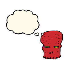 cartoon spooky skull with thought bubble