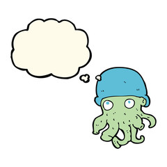 cartoon alien head wearing hat with thought bubble