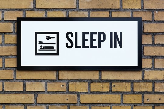 Sleep in sign on a wall