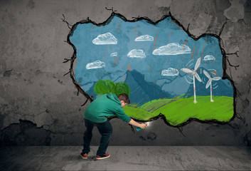 Young urban painter drawing