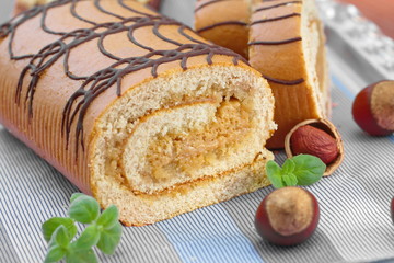 Sweet roll with cream and nuts