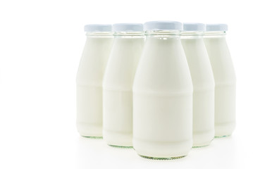 Milk bottle glass isolated on white background