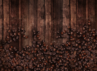 Coffee beans on old wooden 