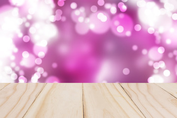 Naklejka na ściany i meble Wooden table with Pink bokeh
