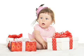 Adorable baby girl  with gifts