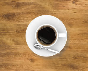 Coffee cup top view on wood