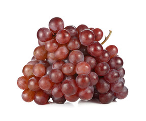 Bunch of red grapes , fresh with water drops. Isolated on white