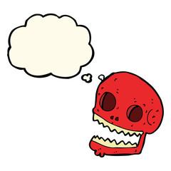 cartoon spooky skull with thought bubble