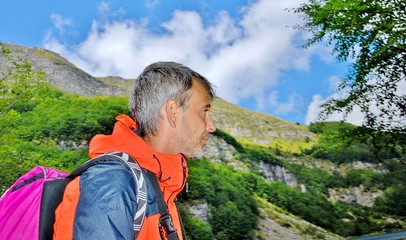 Featured excursionist in mountains