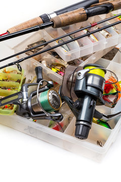 fishing tackles - rod, reel, line and lures in box