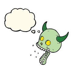 cartoon spooky skull with thought bubble