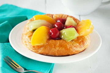 denish pastry with fruit on plate