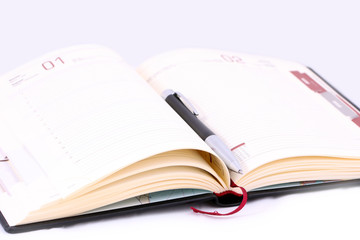 close-up isolated pen on the notebook, diary
